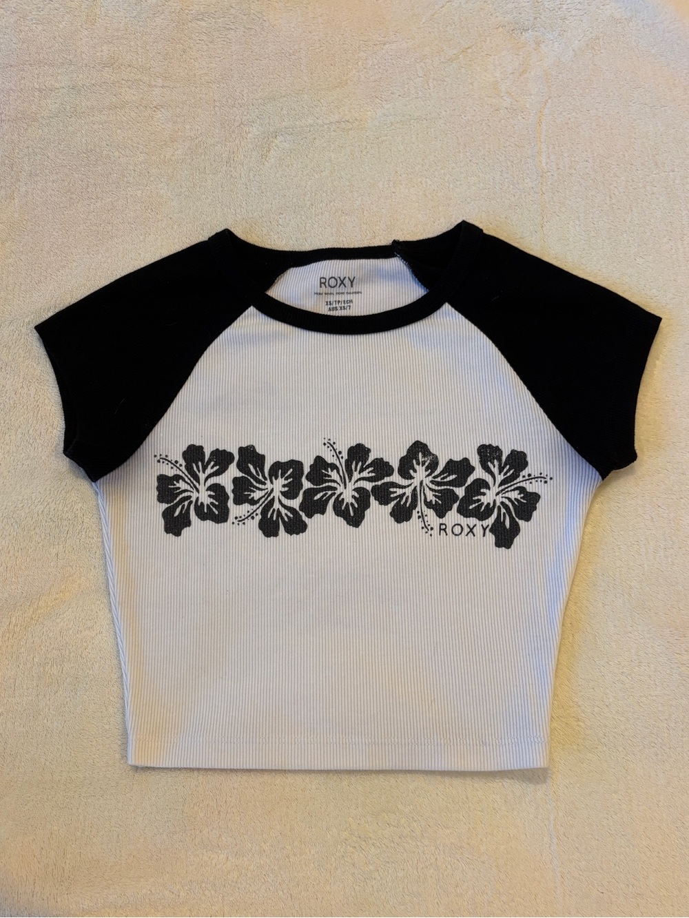Roxy black hibiscus floral cropped baby tee